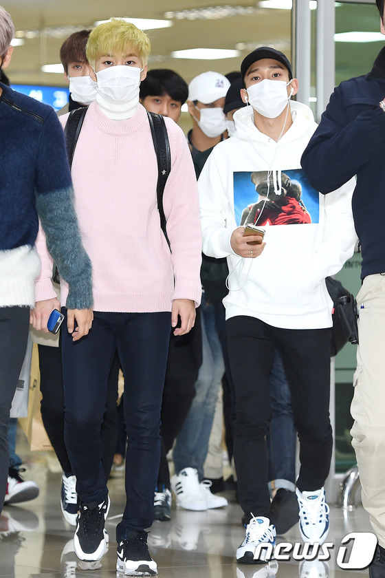 EXO日本巡演后返韩现身机场 穿着休闲面带倦容【组图】