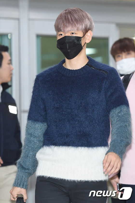 EXO日本巡演后返韩现身机场 穿着休闲面带倦容【组图】