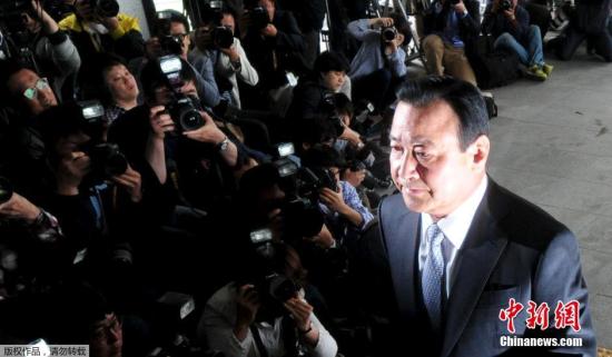当地时间2015年5月14日，韩国前总理李完九为接受检方调查前往首尔高等检察厅。