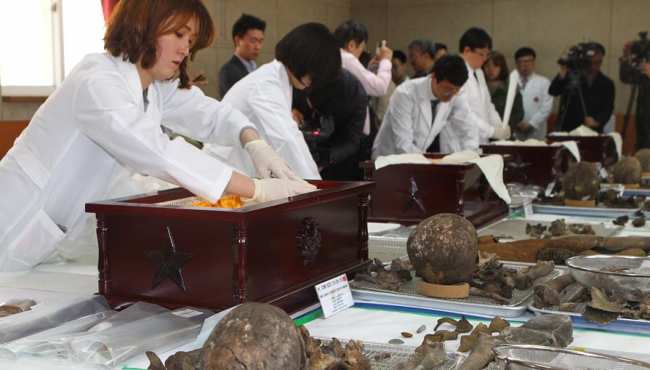 中韩启动第三批在韩中国志愿军烈士遗骸装殓工作（图）