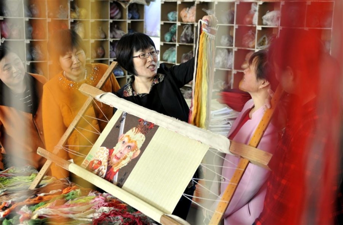 바늘끝의 ‘무형문화유산’---모씨 털실자수